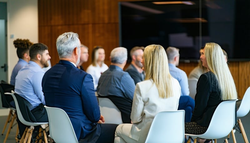 Senior executives engaged in a leadership workshop